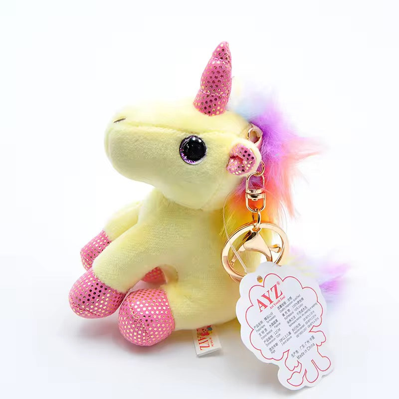 Colorful KIDZPAPA premium keychains featuring cute unicorn, dinosaur, panda, and other adorable animal designs.
