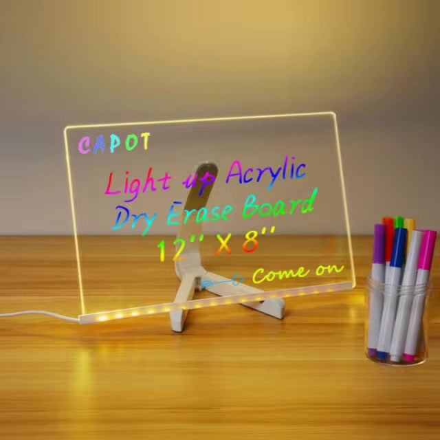 KIDZPAPA LED acrylic writing board with stand, colorful markers, and removable template for creative drawing and writing activities.