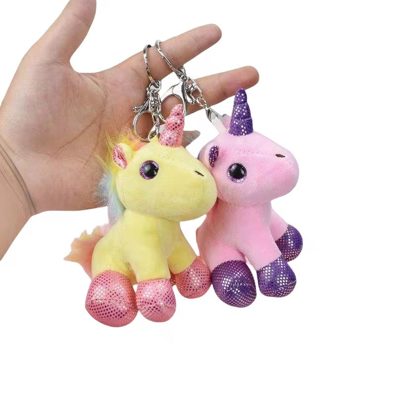 Colorful KIDZPAPA premium keychains featuring cute unicorn, dinosaur, panda, and other playful character designs.