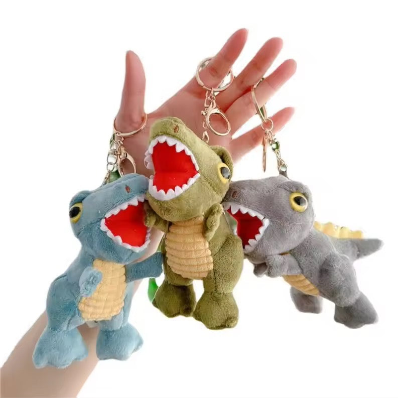 Colorful KIDZPAPA premium keychains featuring adorable unicorn, dinosaur, panda, and other playful designs on a white background.