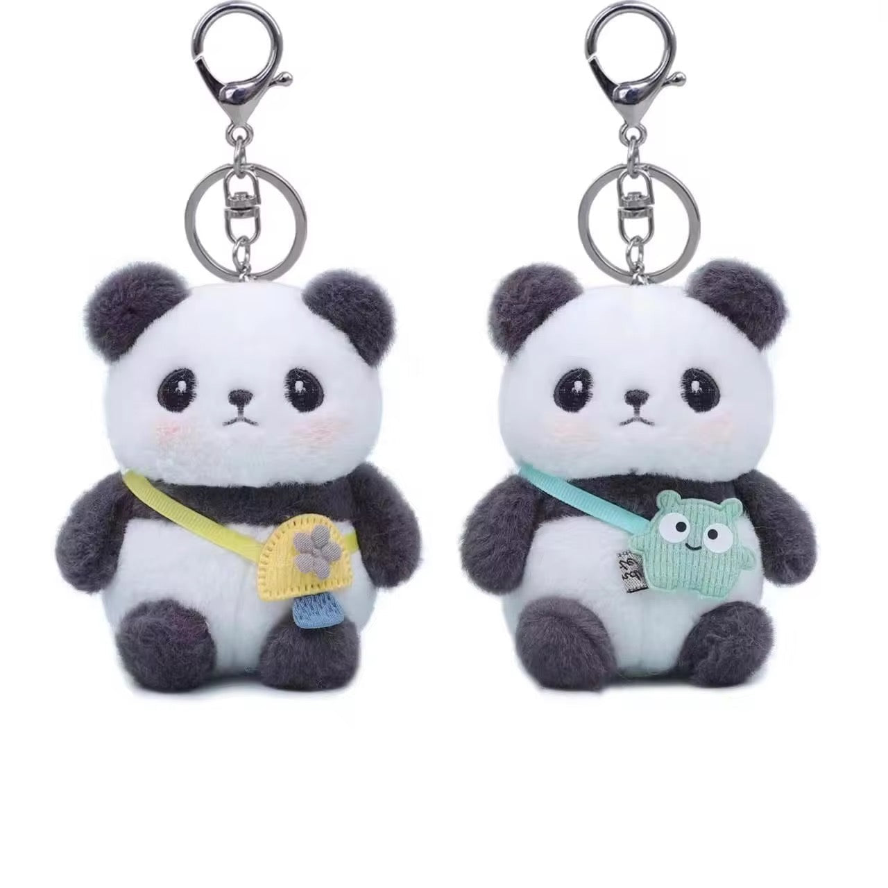 Colorful KIDZPAPA premium keychains featuring unicorn, dinosaur, panda, and other cute character designs on a keyring.
